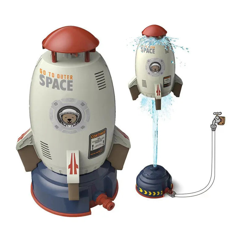 Yellow water pressure rocket launcher toy with base and interface connectors for outdoor garden play