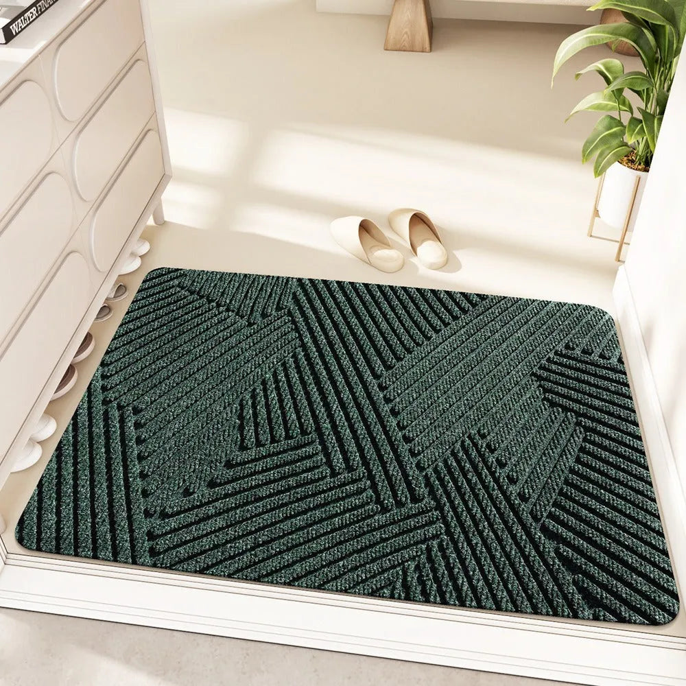 Cartoon alien pattern entrance floor mat with wire ring border in blue colour.