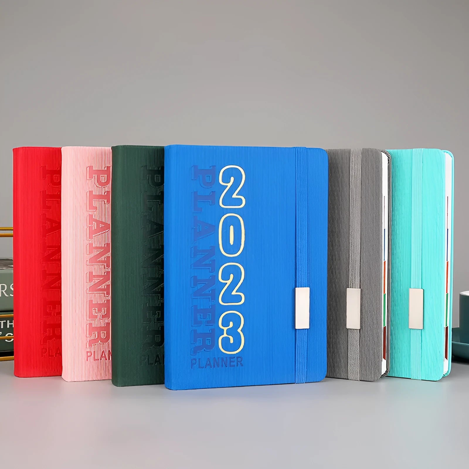 Creative student almanac schedule calendar notebook with imitation leather cover, open to show Daolin paper pages.