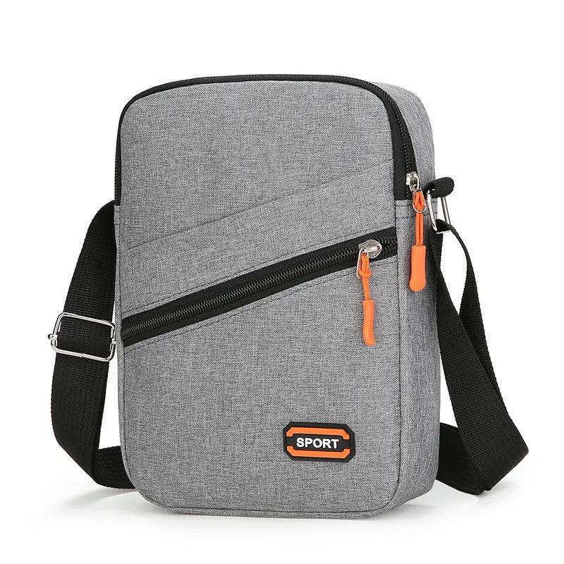 Ultra light Oxford cloth crossbody commuter bag in silver grey, black, or navy blue.