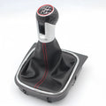 Leather gear shift knob with attached dust boot for Volkswagen Golf manual transmission.