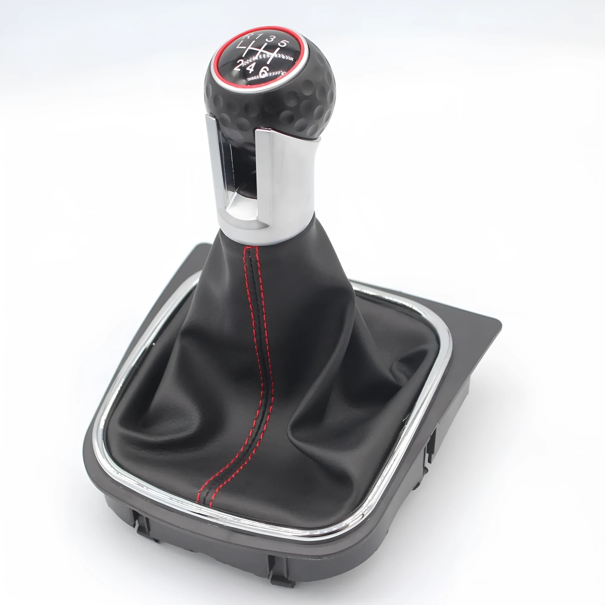 Leather gear shift knob with attached dust boot for Volkswagen Golf manual transmission.