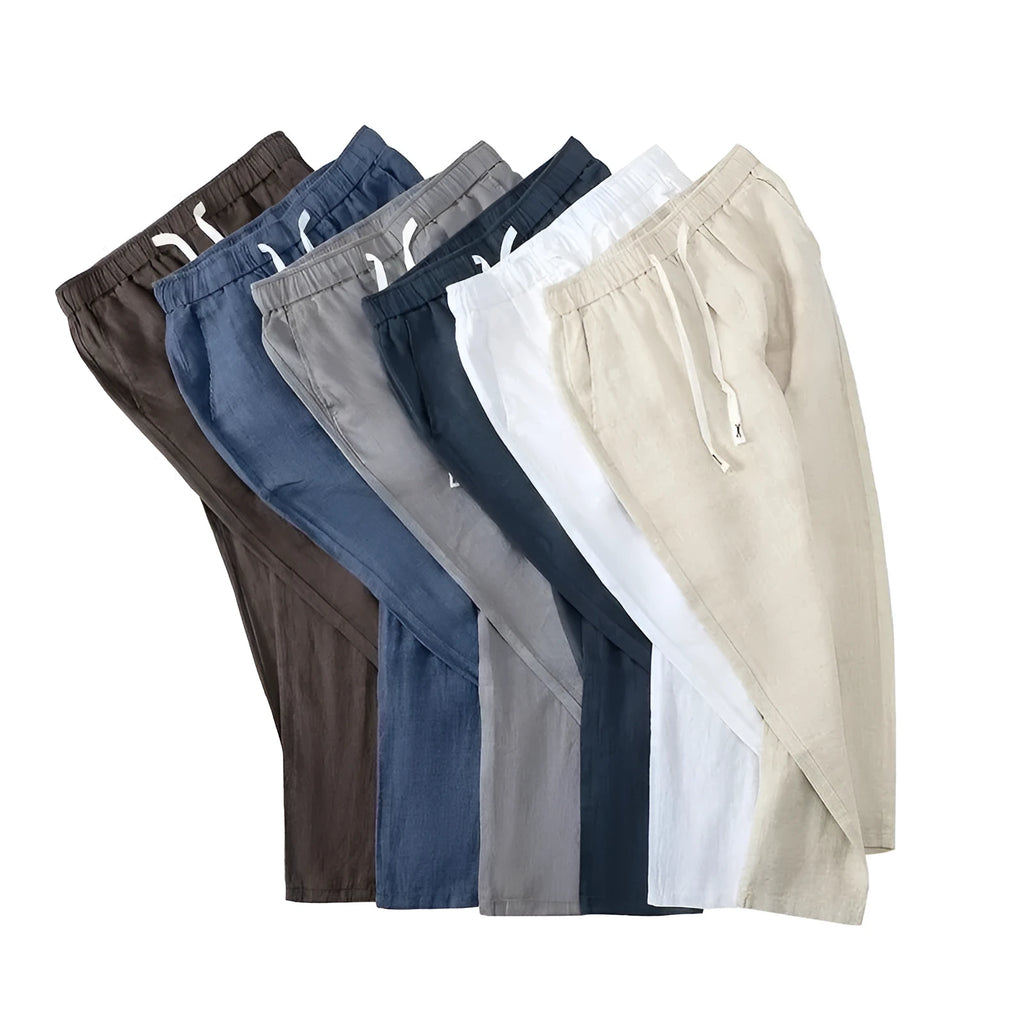 Chinese-style straight leg linen trousers with a drawstring elastic waist in five colour options.