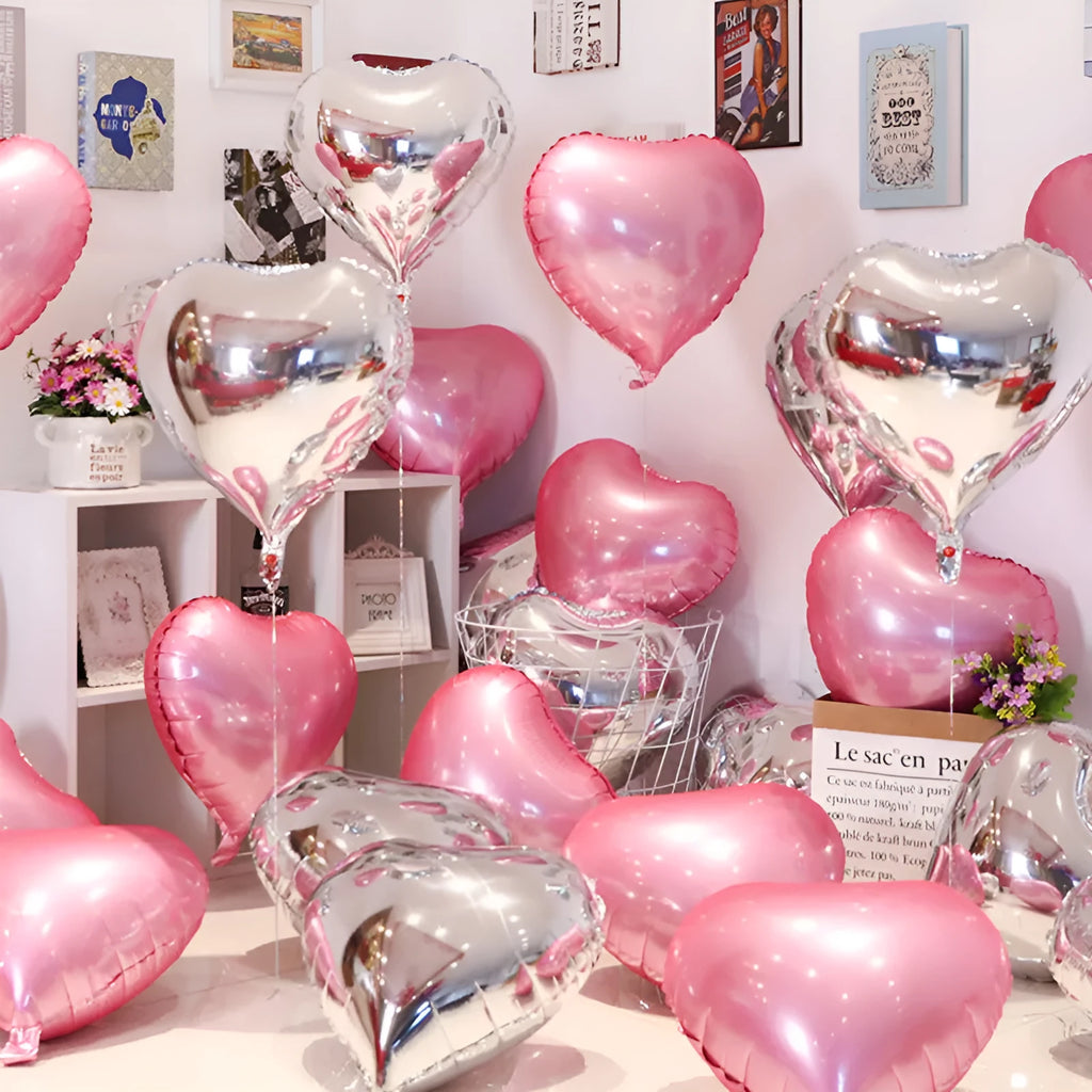 Set of five metallic peach heart-shaped aluminium foil balloons in assorted colours.