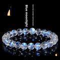 Natural cream body blue moonlight crystal bracelet showing grinding finish on wrist, available in single circle, strip or three ring designs.