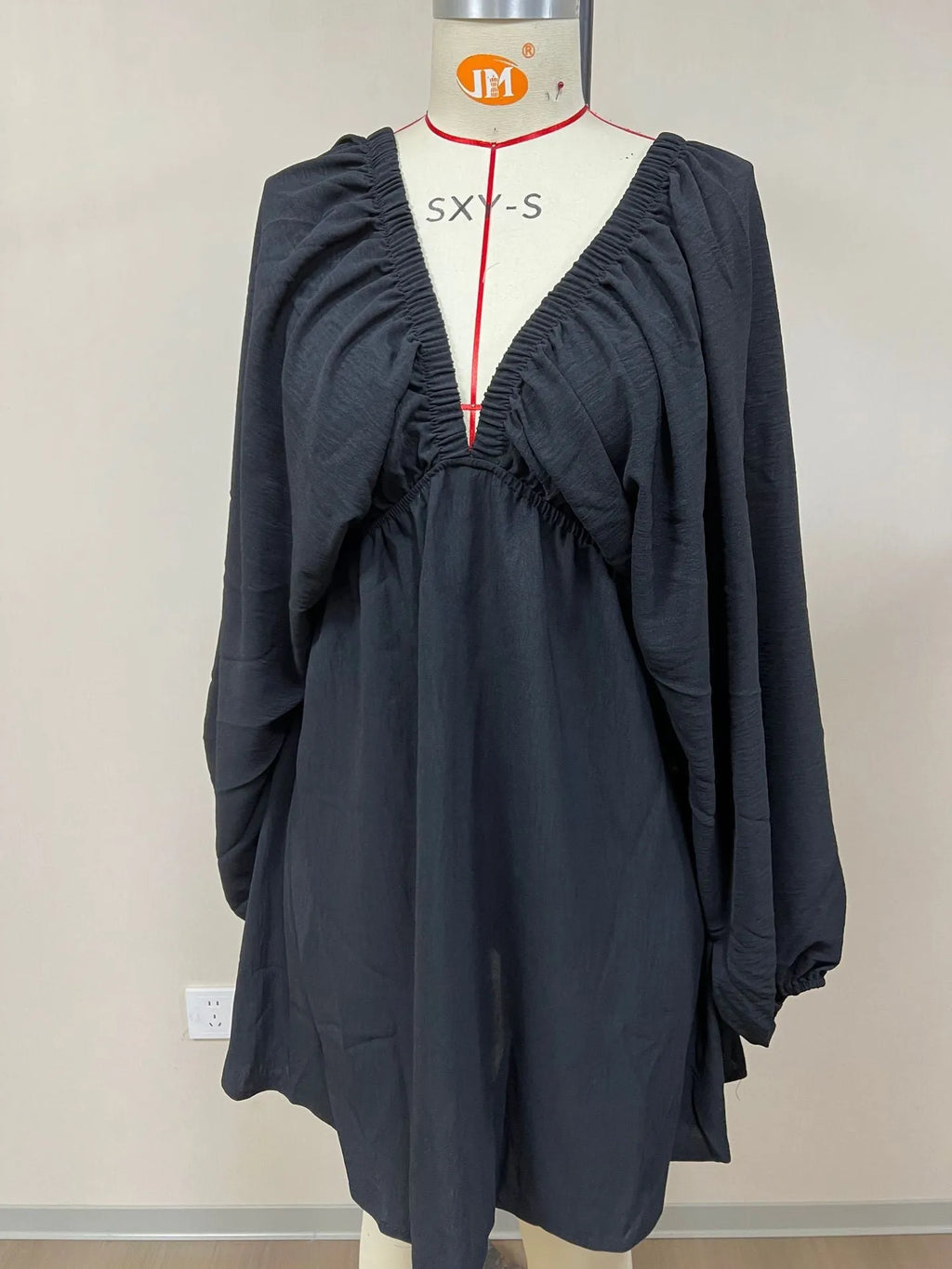 Women's polyester puff sleeve dress with V-neck and flounced swing skirt in apricot colour