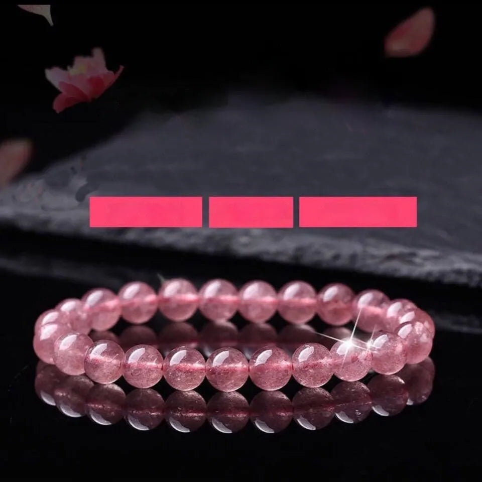 Women's strawberry quartz bracelet showing three bead size options: 6mm, 8mm, and 10mm polished crystal beads.