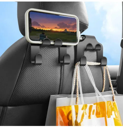 A white ABS plastic car multifunction hook shown as a phone holder and hanging hook.