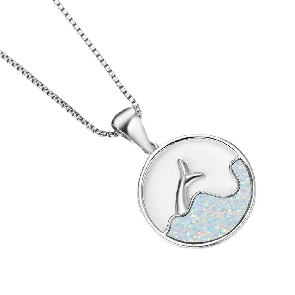 White gold plated fishtail pendant necklace with round blue opal stone on a 45 cm chain.
