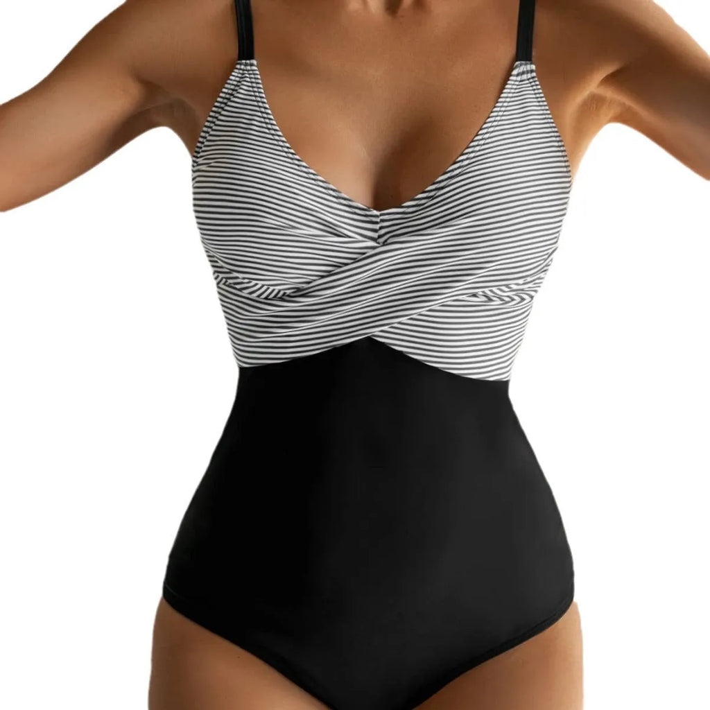 Women's printed bikini swimsuit with a lace-up front and backless gathered design in a floral pattern.
