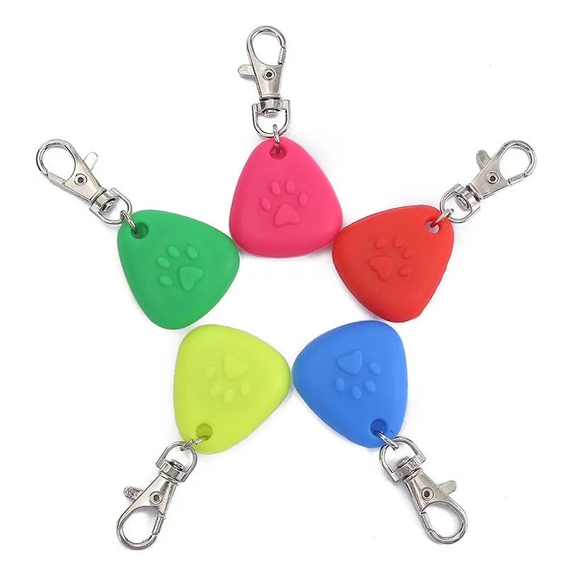Silicone triangle-shaped pet pendant ornament in assorted colours for light-up collars.