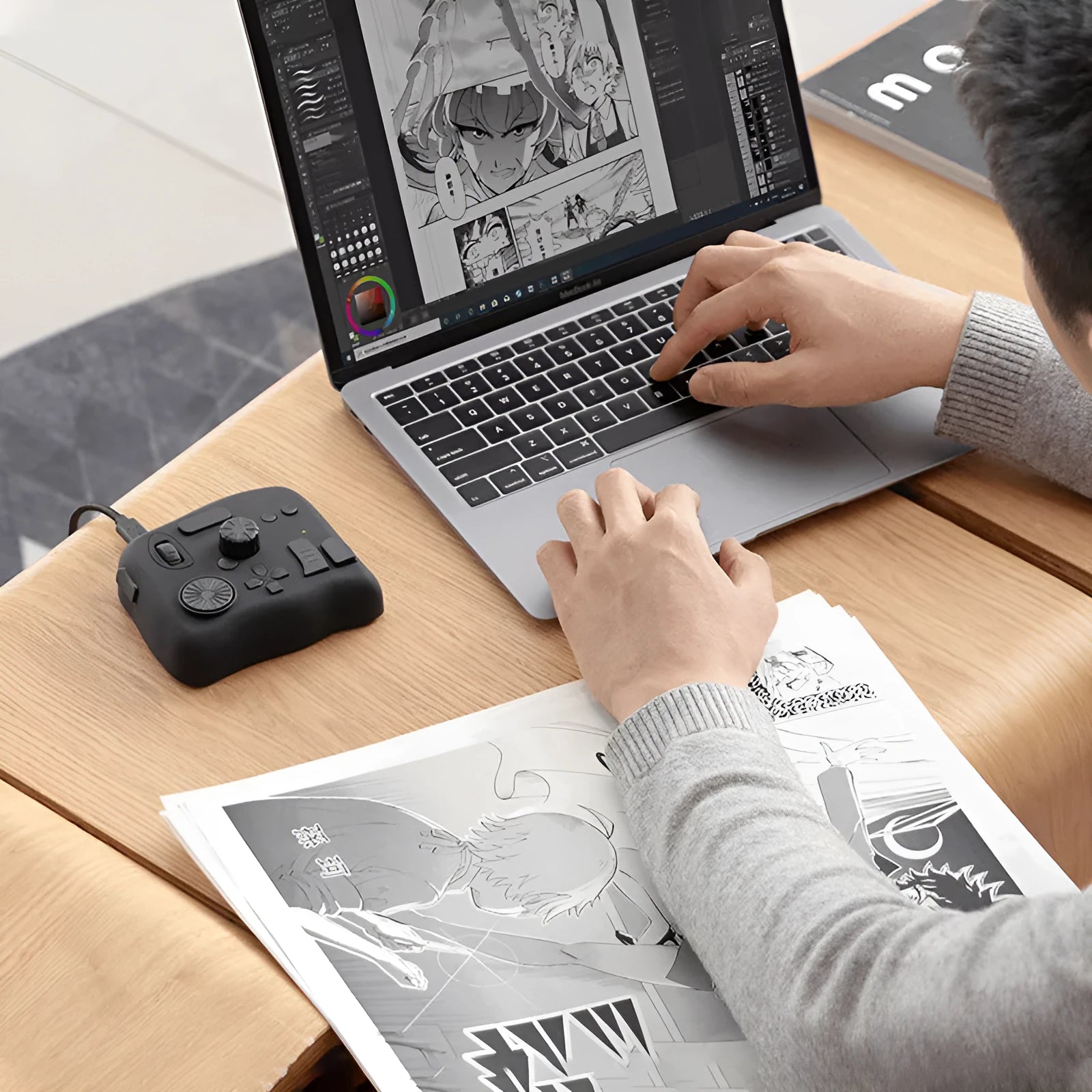 TourBox NEO black auxiliary keyboard for video editing on a desk