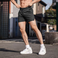 Men's straight-cut polyester fitness shorts in black, available in sizes M L XL 2XL 3XL