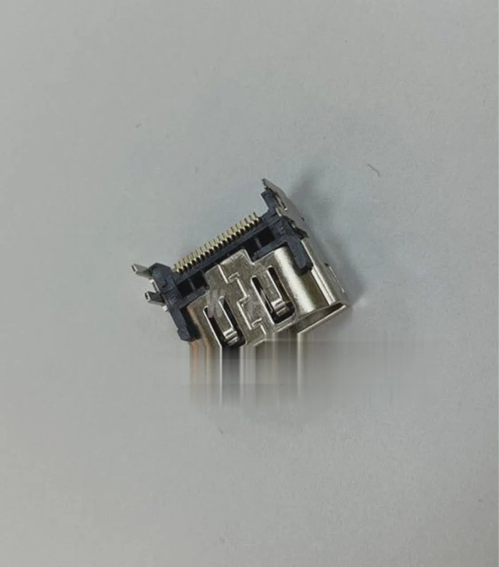 Silver HDMI host socket connector for game console repair.