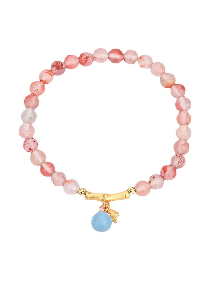 Ice float nanhong agate ethnic bracelet with bamboo joint links and flower decoration in hetian jade colour