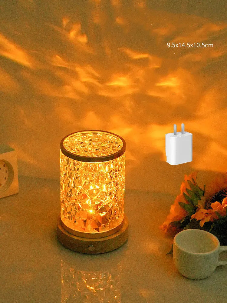 Rotating water ripple night light with acrylic element on solid wood base for bedroom use
