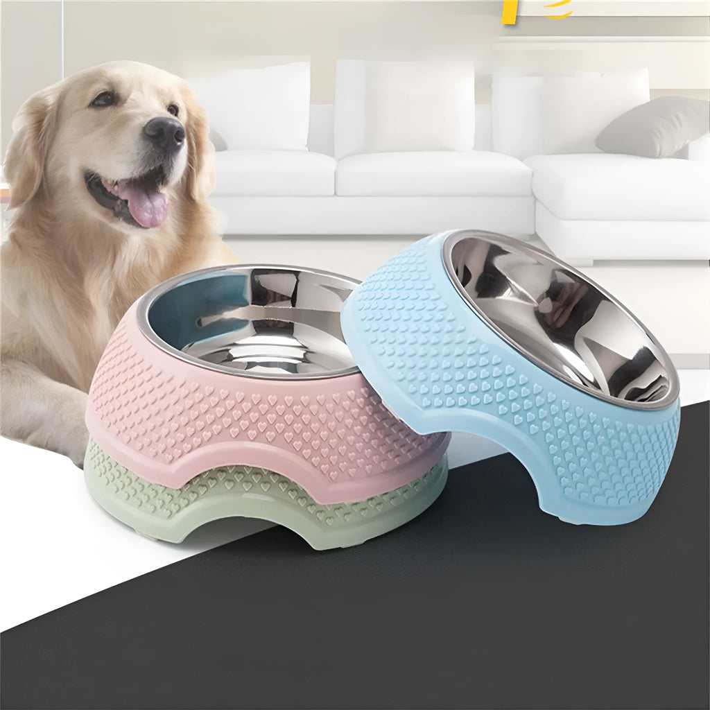 Blue stainless steel pet bowl with a non-slip weighted base on a floor.