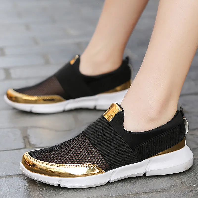 Women's low-top casual sneakers in blue, featuring a breathable mesh design and a PU midsole.
