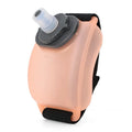 Orange silicone wrist water bottle with black Velcro strap, shown on a wrist, 200ml capacity.