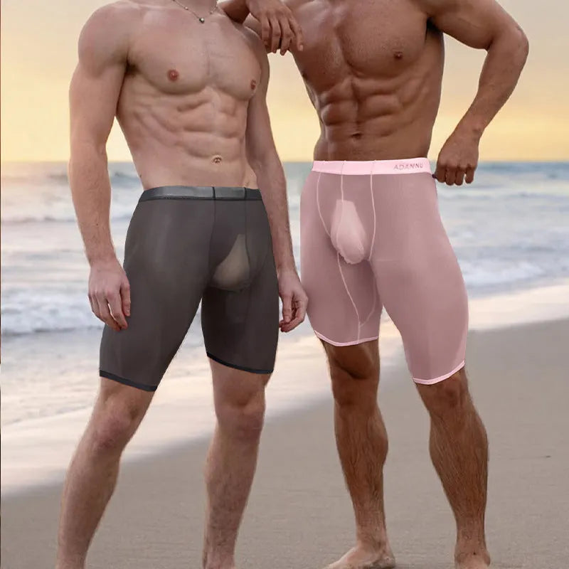 Men's black seamless mesh home shorts with a knitted texture and hip-lifting design.
