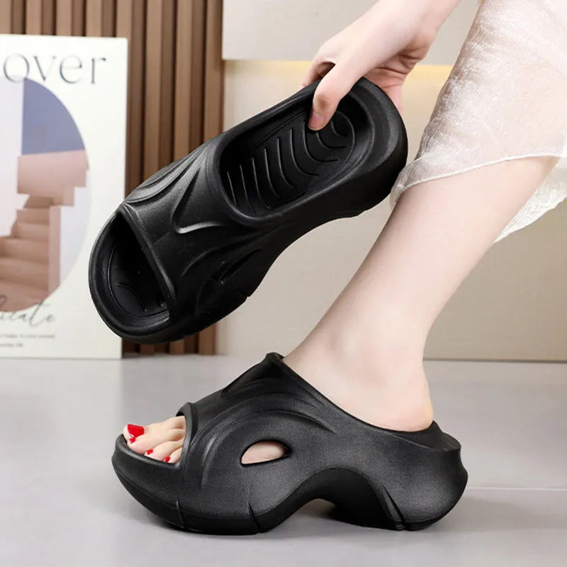 Women's thick-soled EVA foam slippers in white, black, and rose red colours with round toe design