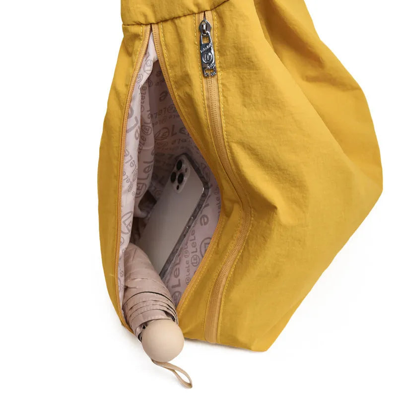 Women's heart-shaped nylon underarm bag in black, yellow, khaki, or blue colours with large capacity
