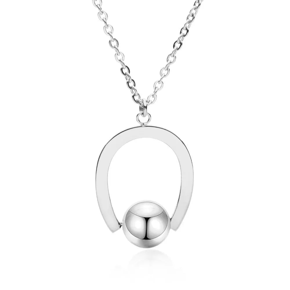 Adjustable stainless steel necklace with geometric pendant on a cross chain in gold or silver.