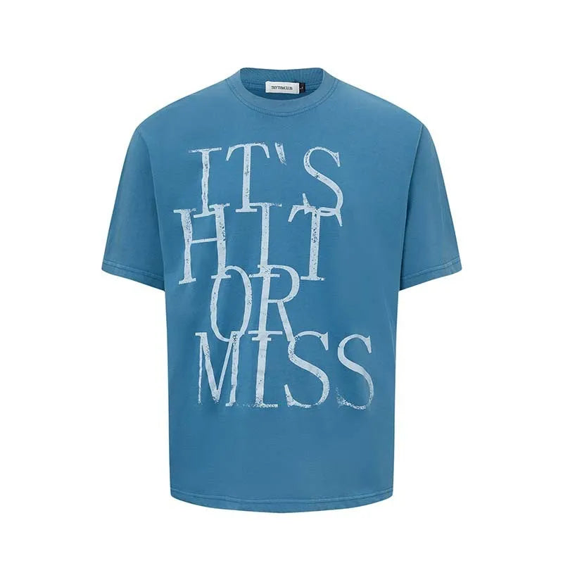 Man's loose blue cotton blend T-shirt with white retro letter printing on the front.