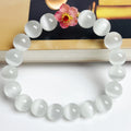 Handmade glass bead bracelet with flower design for women in yellow, pink, white, or green.