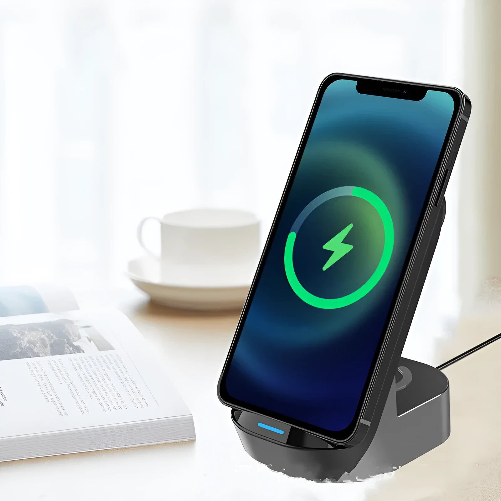 Black and grey foldable 3-in-1 wireless charging stand for phone, watch, and earbuds on a desk.