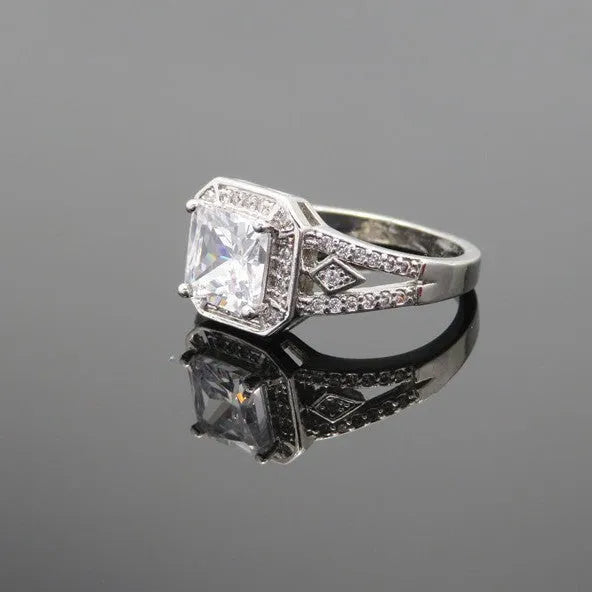 Geometric women's zircon ring with hollow quadrilateral design in platinum colour on copper