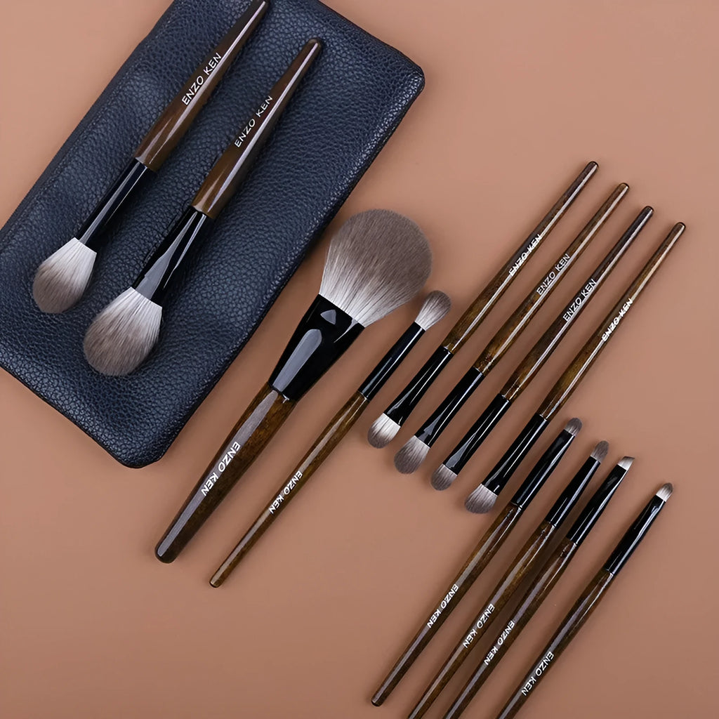 12-piece makeup brush set with wooden handles and a black PU storage pouch.