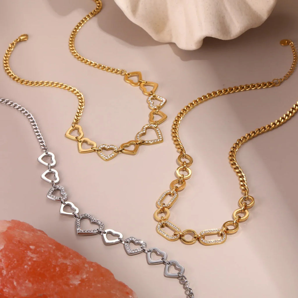 Geometric heart-shaped stainless steel necklace with 18K gold electroplated finish on clavicle chain