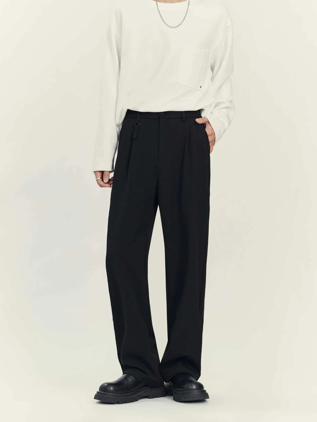 Men's black business casual straight-leg trousers with loose drape styling