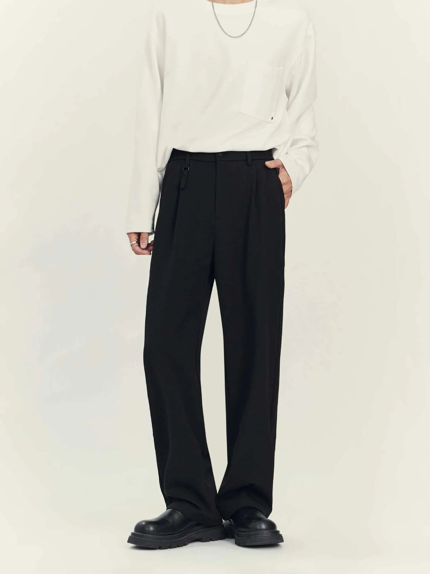 Men's black business casual straight-leg trousers with loose drape styling