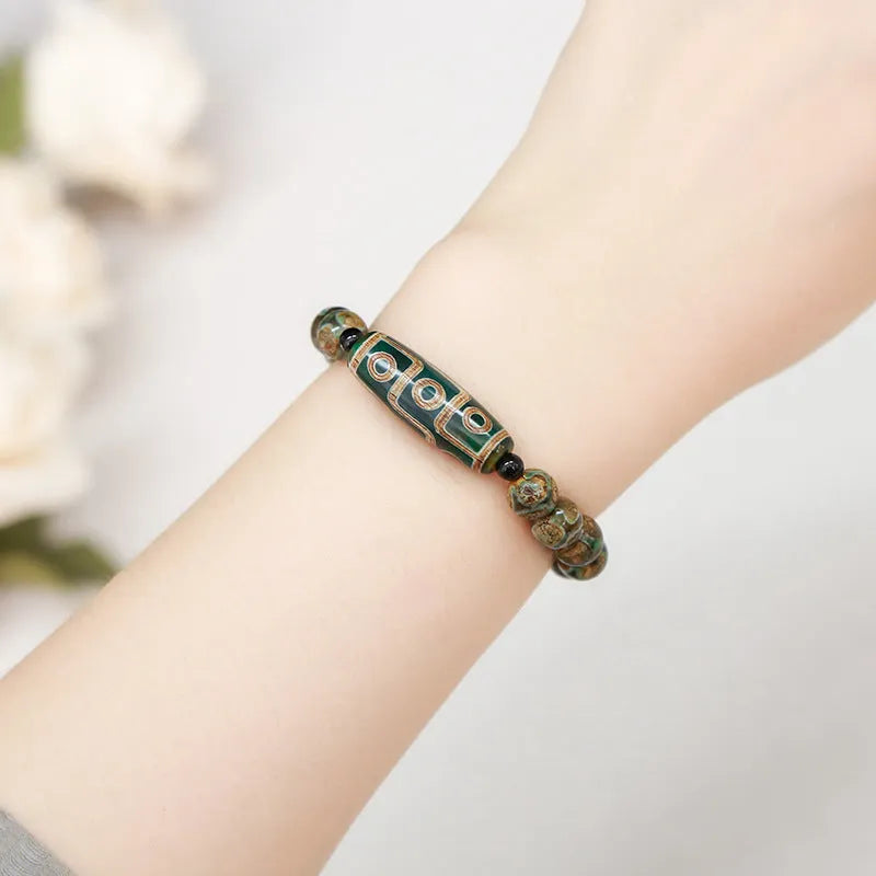Green dzi bead barrel bracelet with 8mm diameter 28mm length beads
