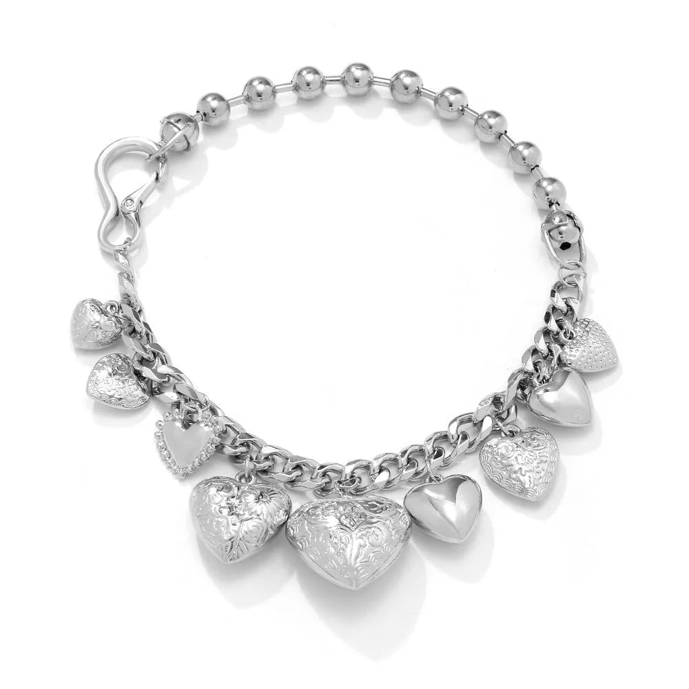 Carved heart pendant necklace with adjustable chain in gold or white K metal alloy