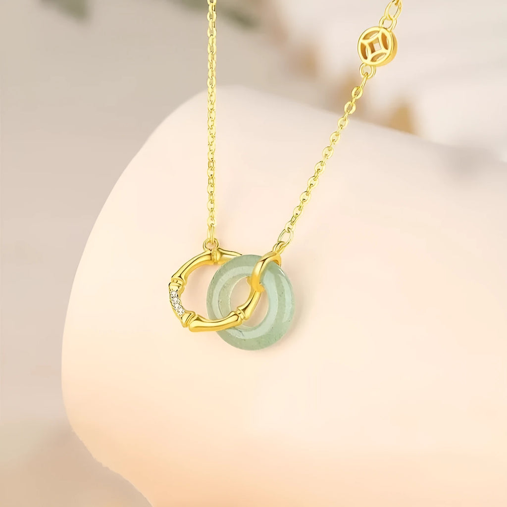 Sterling silver bamboo peace buckle pendant necklace with pearl accents on adjustable O-ring chain
