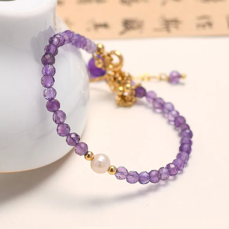 Women's Chinese style bracelet with diamond-shaped crystal beads in electroplated amethyst colour