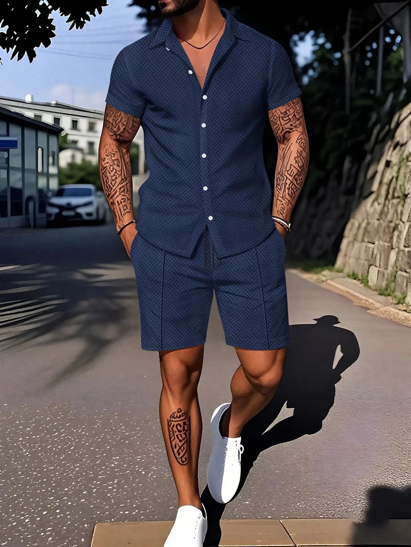Man wearing a digitally printed short sleeve casual suit set in a neutral colour.