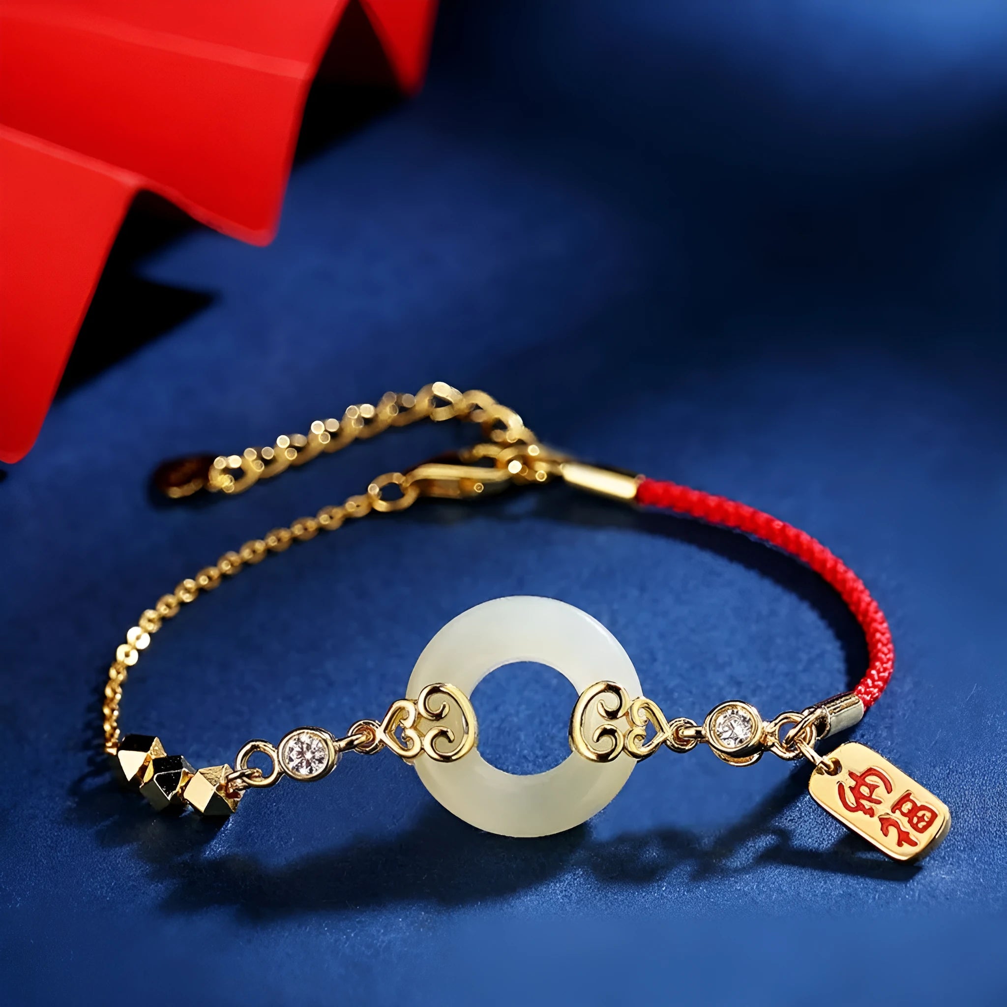 Chinese style sterling silver jewellery set showing gourd bracelet, Fu character necklace, and earrings with Hetian jade inlay.