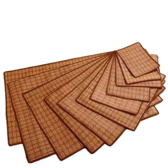 Natural brown woven rattan fibre cooling mat for dogs on a wooden floor