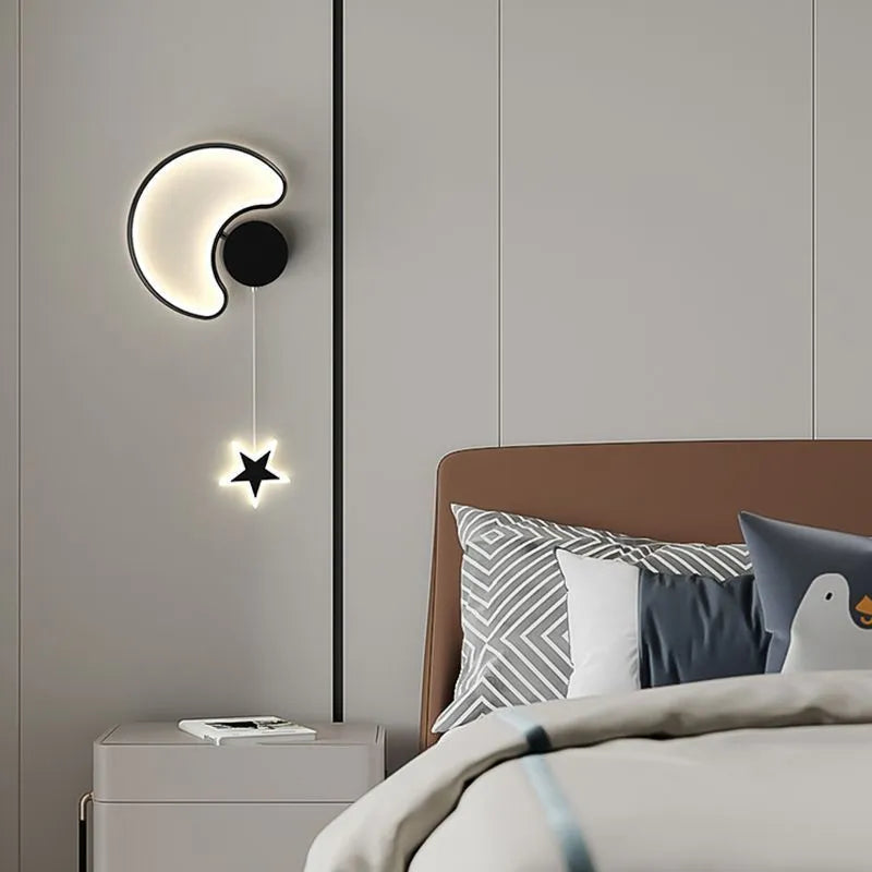 White left-facing cloud children's bedside wall lamp with a three-colour LED light on a bedroom wall.