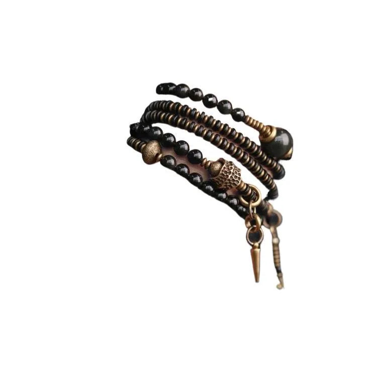 Black geometric beaded bracelet with multi-layered construction