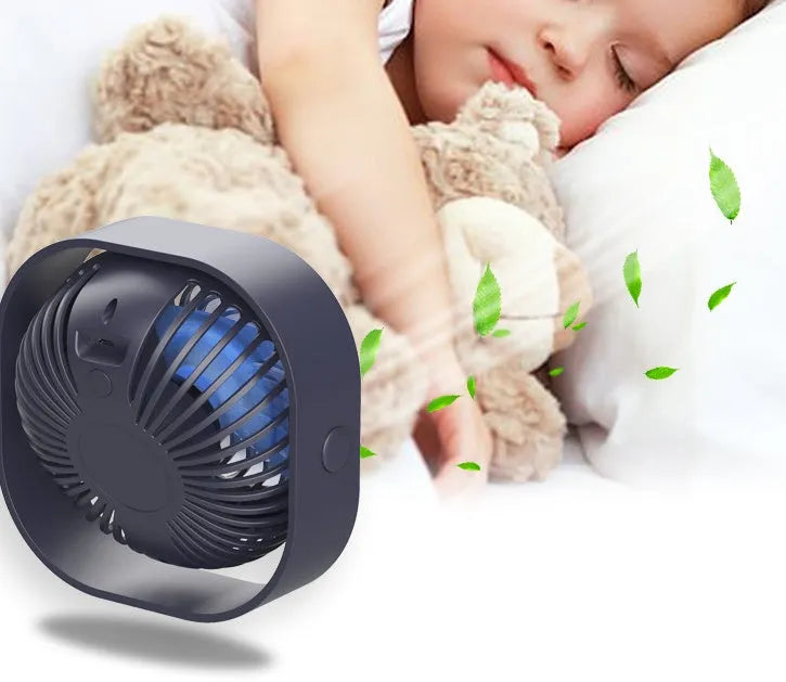 USB-powered desk fan with alarm clock in modern design, showing 360-degree rotation head in blue colour