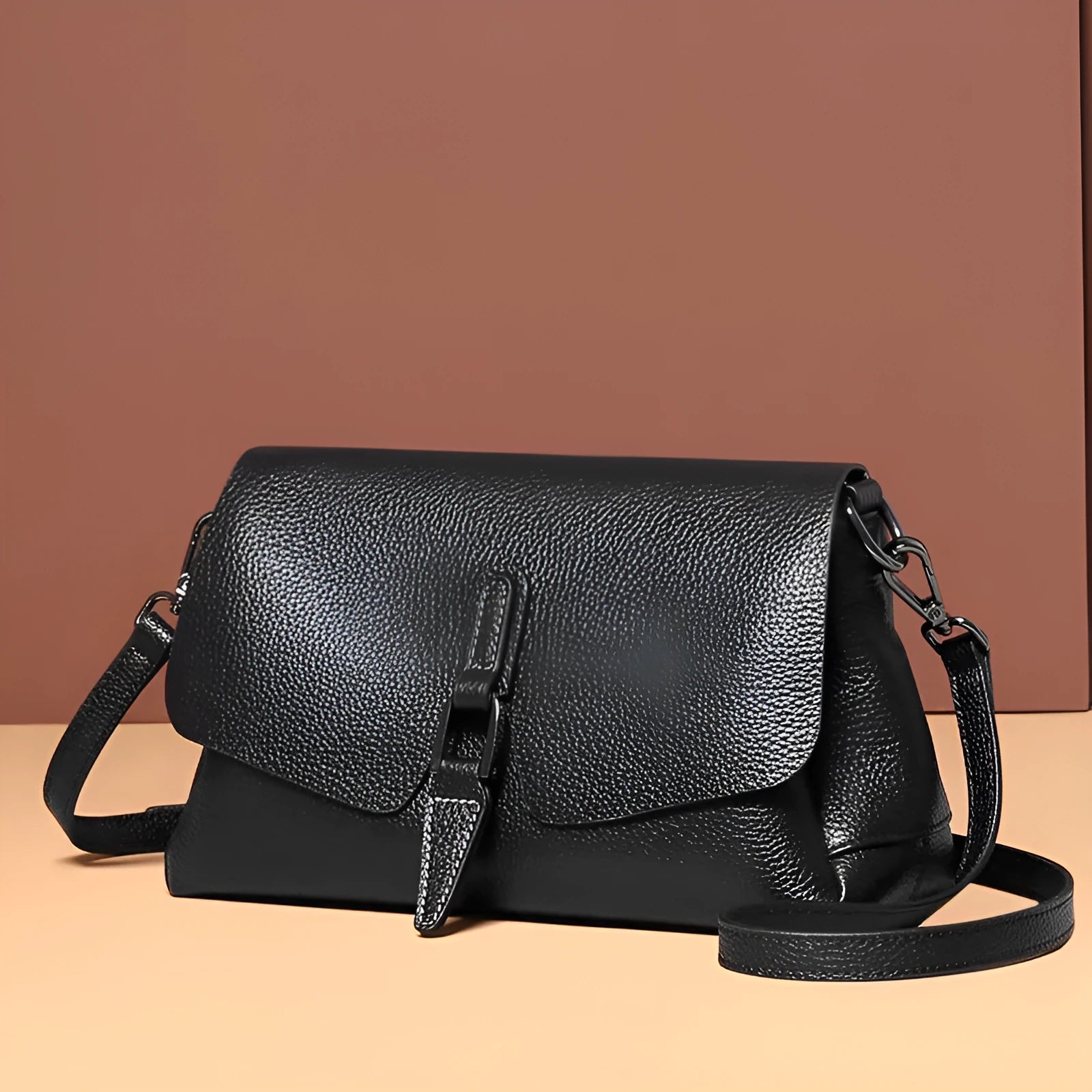 Women's soft first layer cowhide shoulder bag in black with adjustable strap and multiple pockets