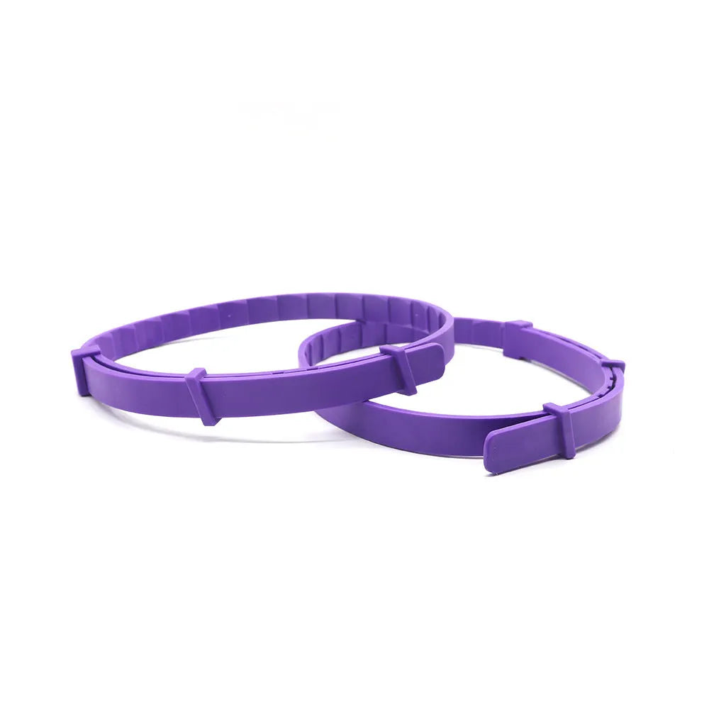 Set of four Chinese-style monochrome dog anxiety collars in assorted colours on a TPR strap.