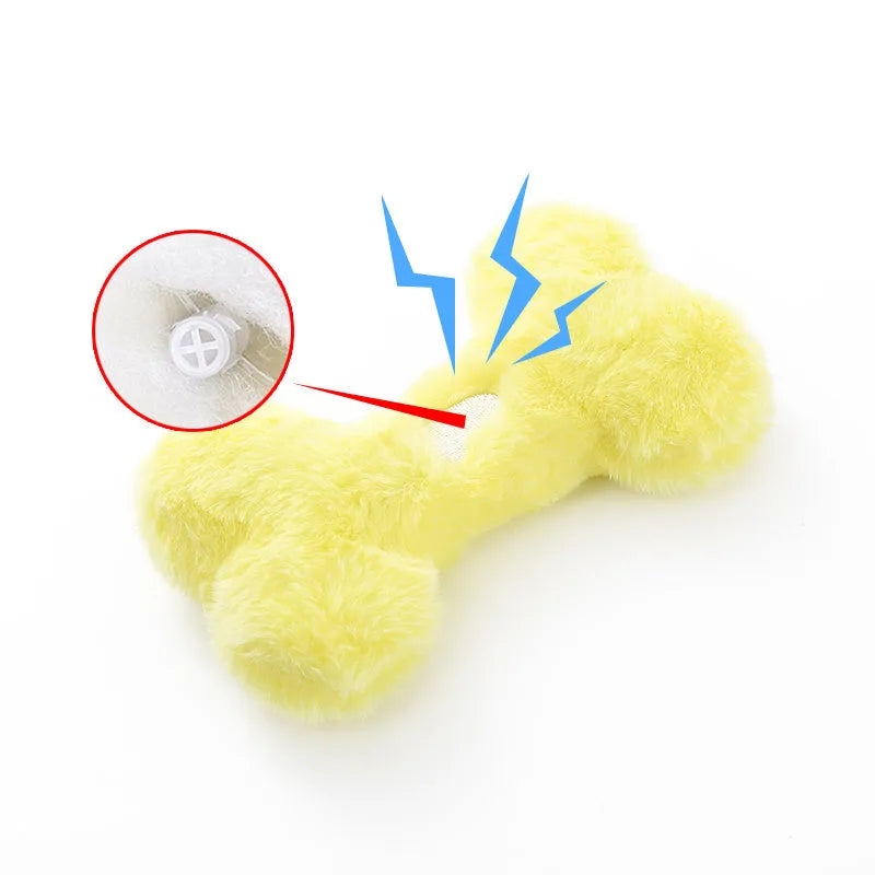 Bone-shaped plush dog toy with hearts and 'Love' text, containing squeaker for interactive pet play
