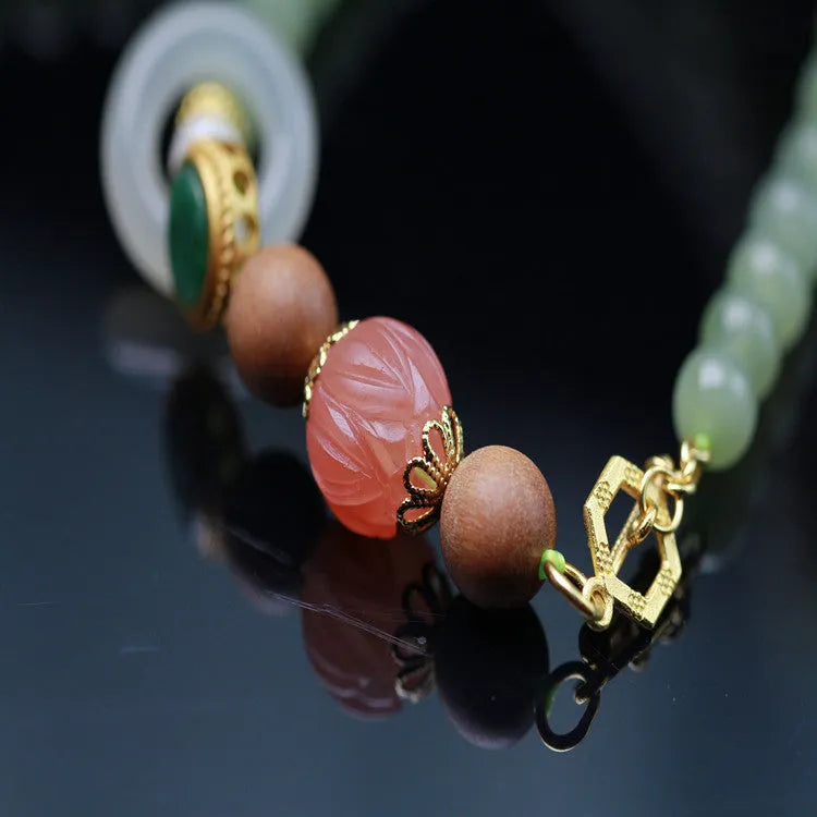 Hetian jade red lotus beads necklace with white sandalwood beeswax bracelet featuring zodiac animal modelling