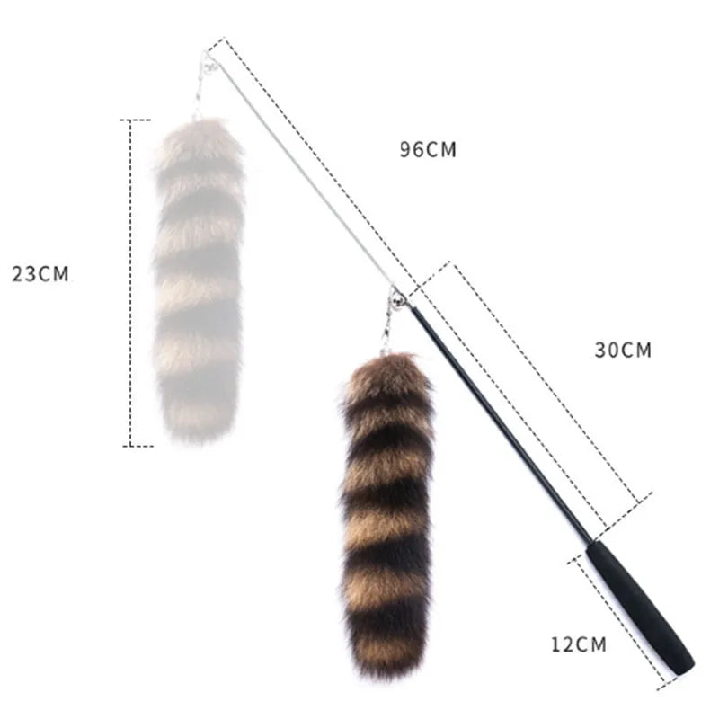 Black cat toy wand with a long elastic string and an attached teaser for interactive play.